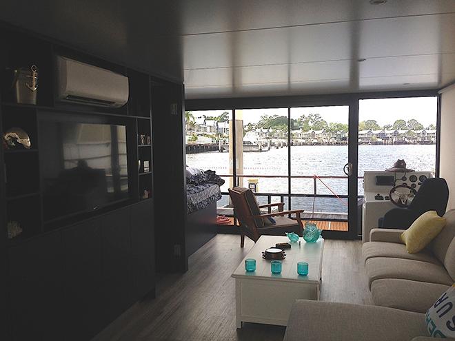 Air-conditioning and a massive TV ensures everyone enjoys their time aboard the Havana Houseboats 45ft Entertainer © Emma Milne